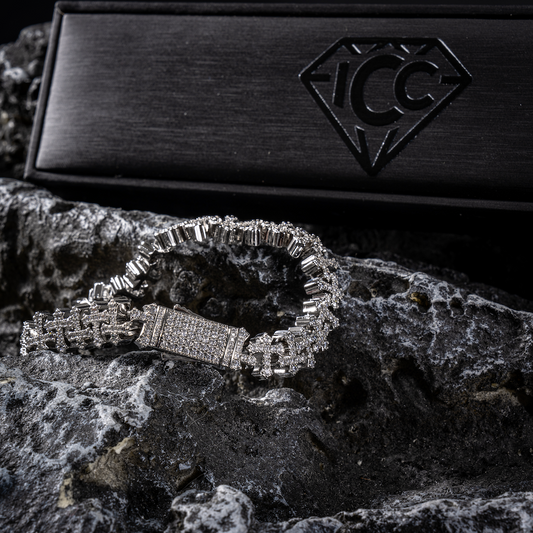 White gold cross-link bracelet with rectangular pavé clasp and linked cross charms
