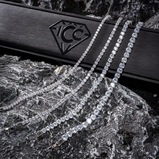 Silver moissanite tennis chain bracelet with rectangular stone links, multi-row.
