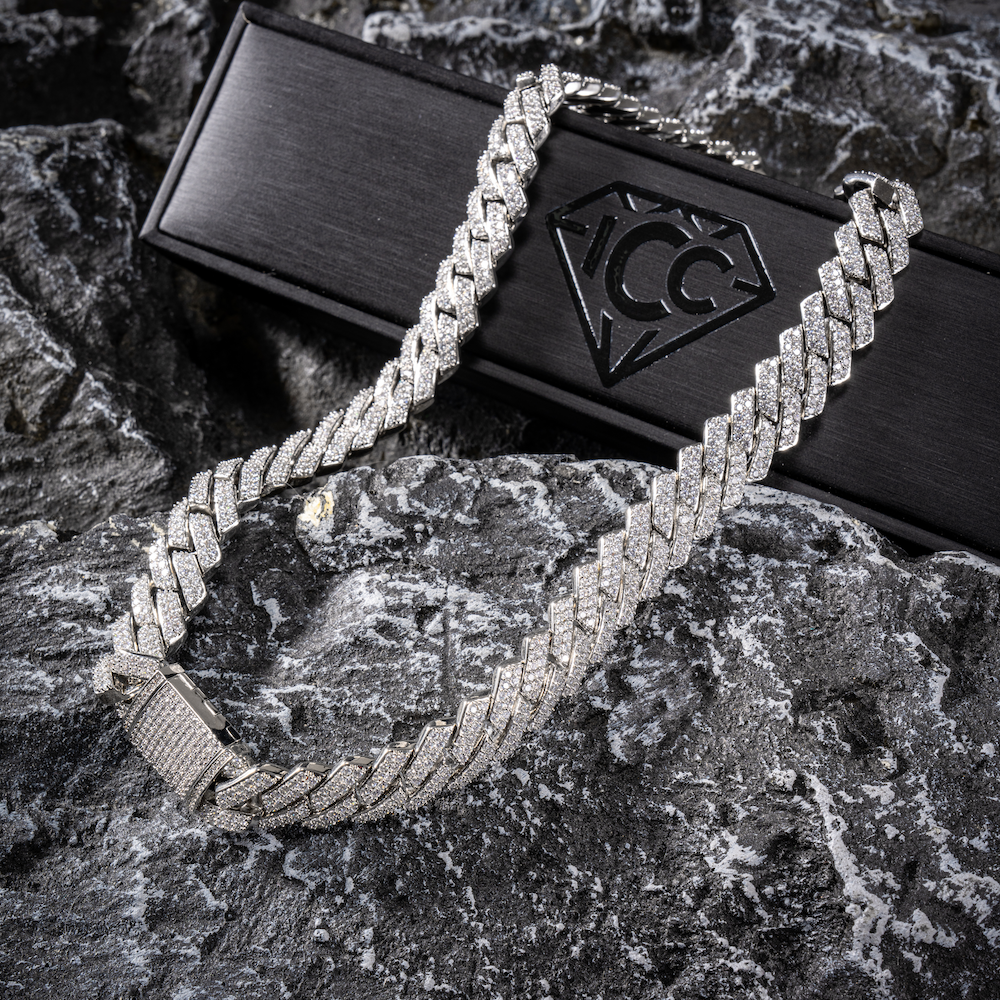 Cuban link moissanite chain in white gold, prong-set links and clasp detail