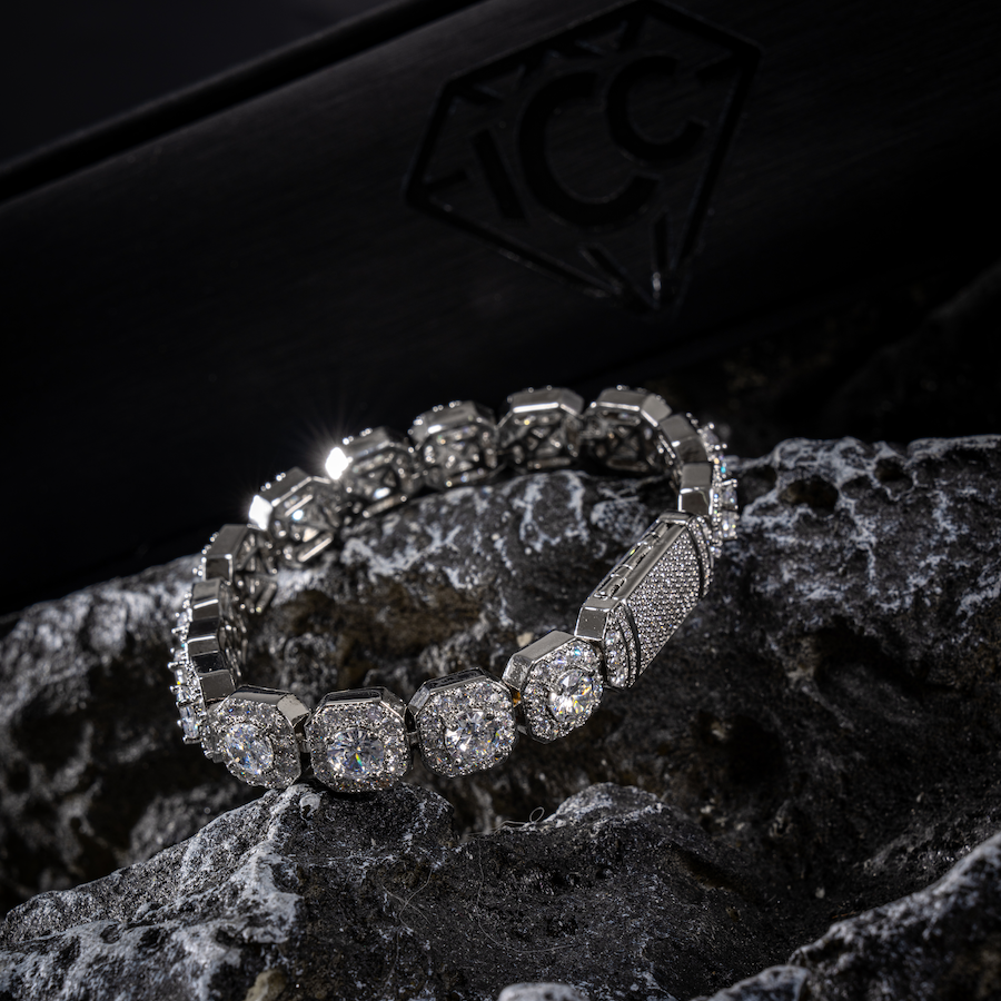 White gold CZ tennis bracelet with bezel-set round stones and box clasp