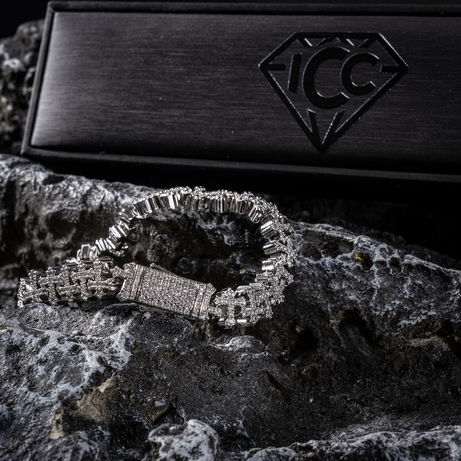 White gold cross-link bracelet with rectangular pavé clasp and linked cross charms
