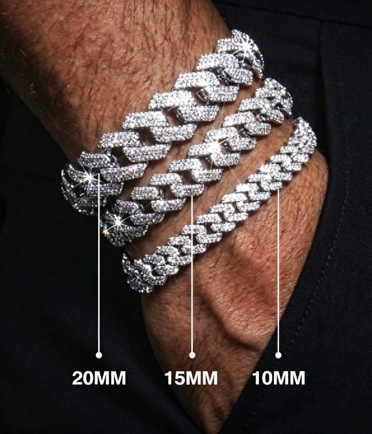 Silver-tone Cuban link bracelet with sparkling stones on wrist