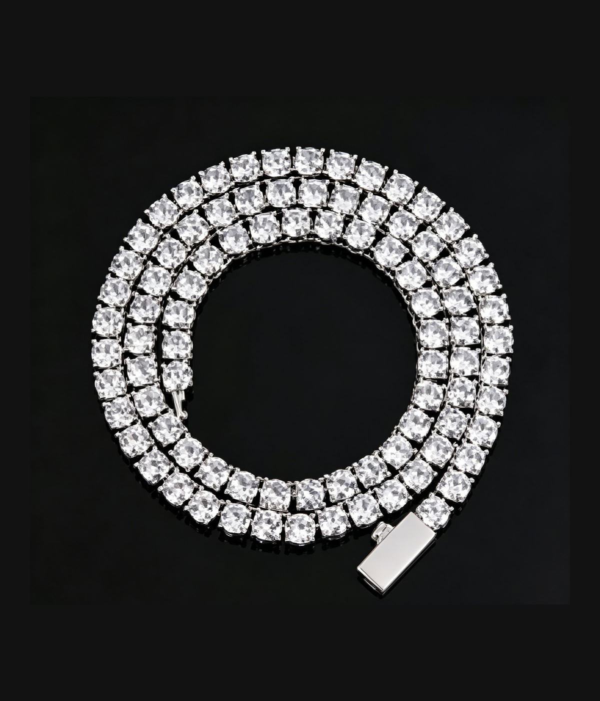 Silver moissanite tennis chain loop with rectangular stones and a spring clasp.