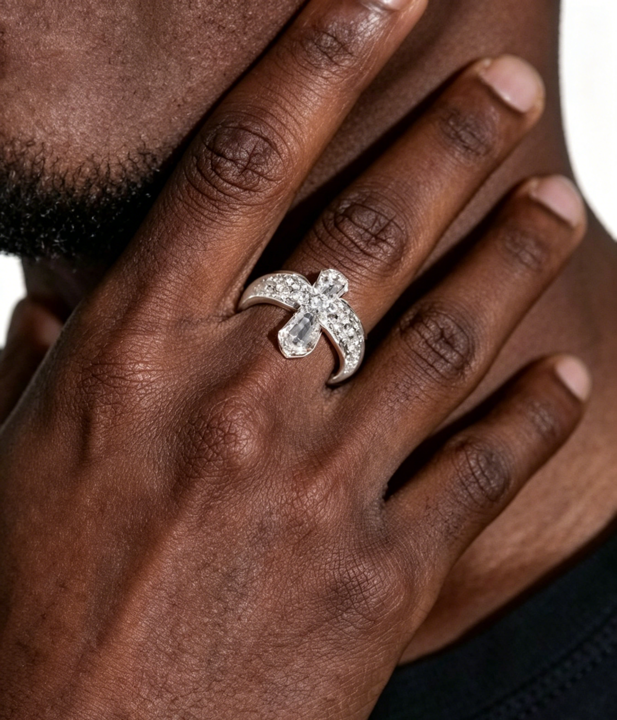 Silver-tone gothic cross ring with large center stone and small side stones