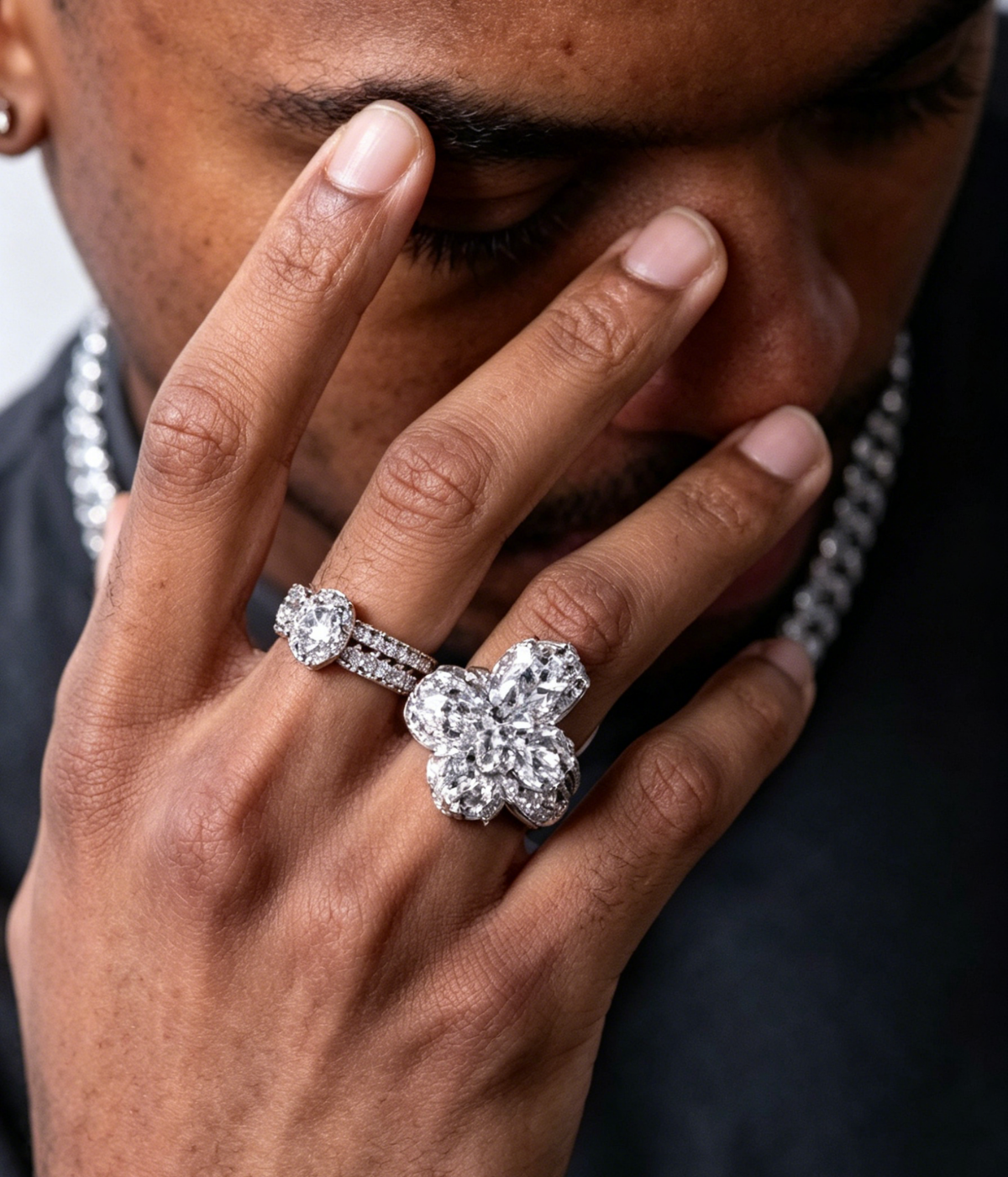 VVS(CZ) fleur cross ring on hand, round center with diamond halo