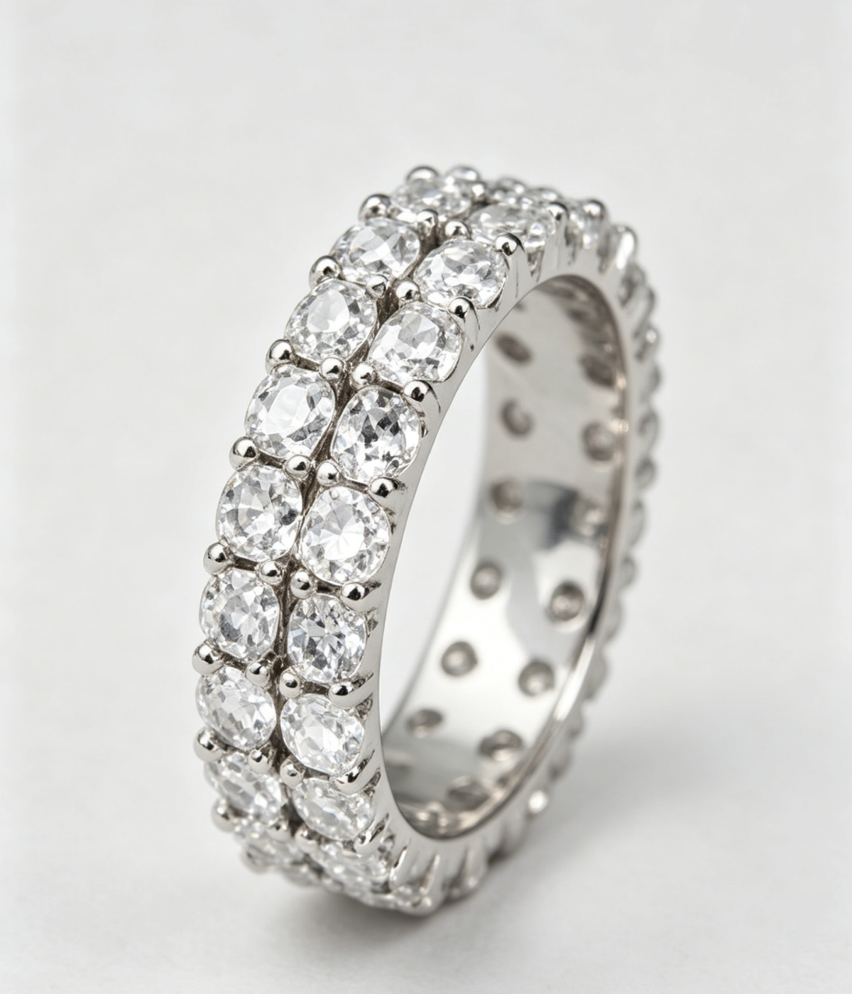 Two-row moissanite band ring with prong-set round stones, silver tone